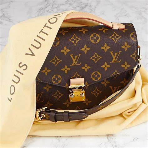 louis vuitton crossbody clutch|Louis Vuitton signature crossbody.